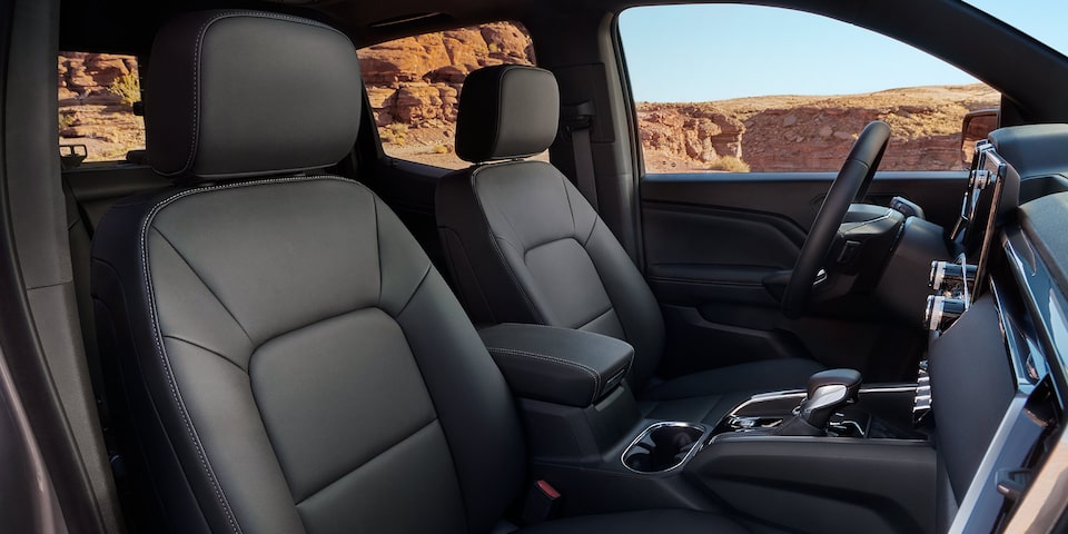 Passenger Door View of the 2025 GMC Canyon Front Row Interior and Leather Seats