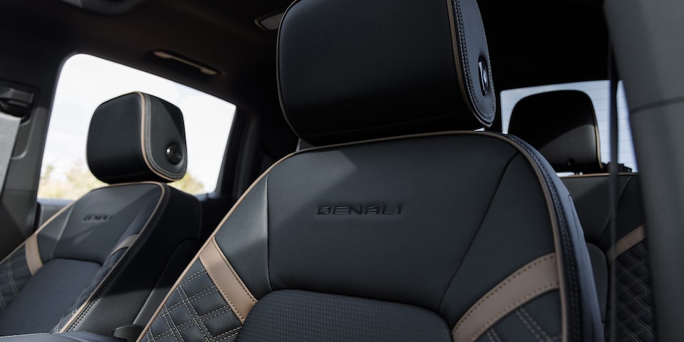 Close-up of the 2025 GMC Canyon Denali Front Row Leather Seats with Trim Printed on Seat