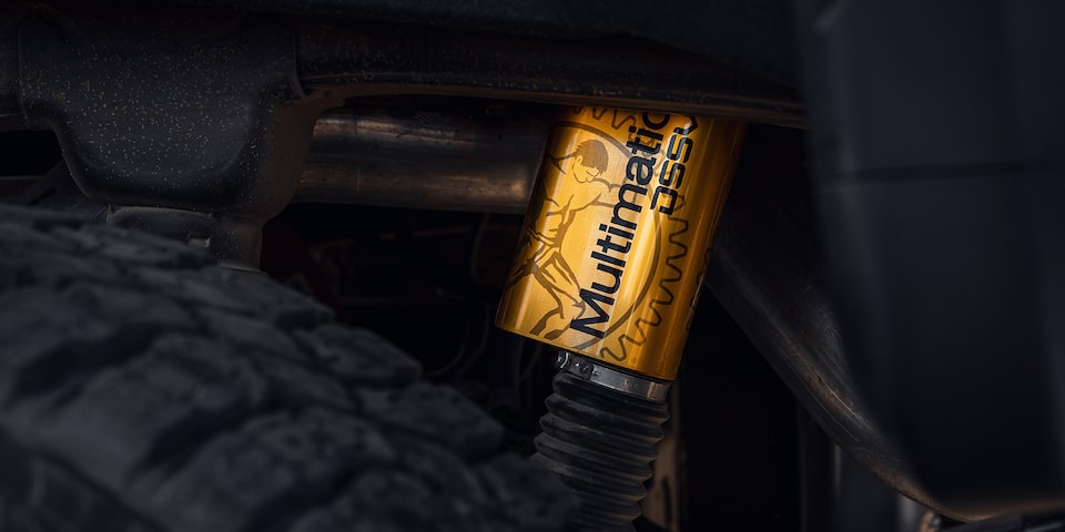 Close-up of Multimatic DSSV Dampers on a GMC Vehicle
