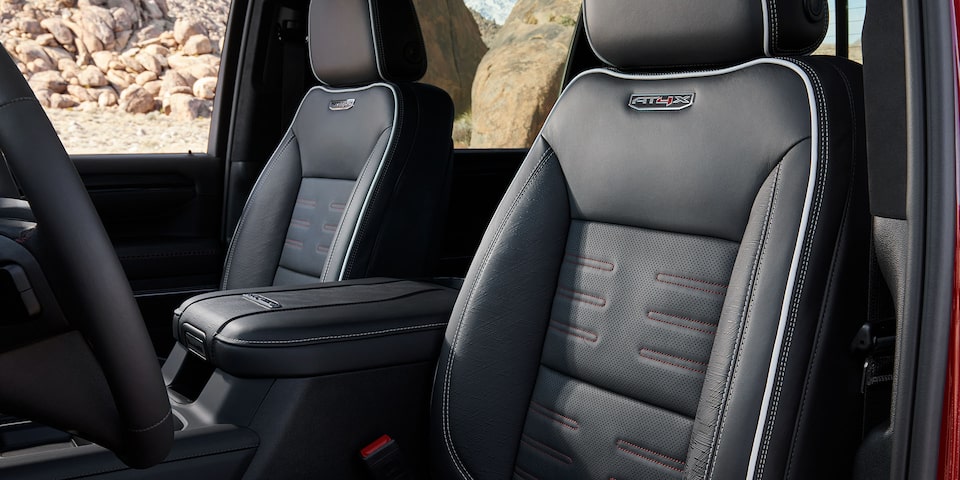 Interior View of Front Seats in a 2025 GMC Sierra HD AT4 Truck