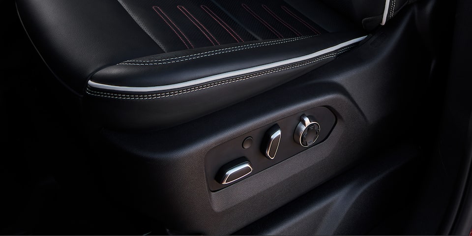 Close-up View of the Seat Controls in a 2025 GMC Sierra HD AT4 Truck