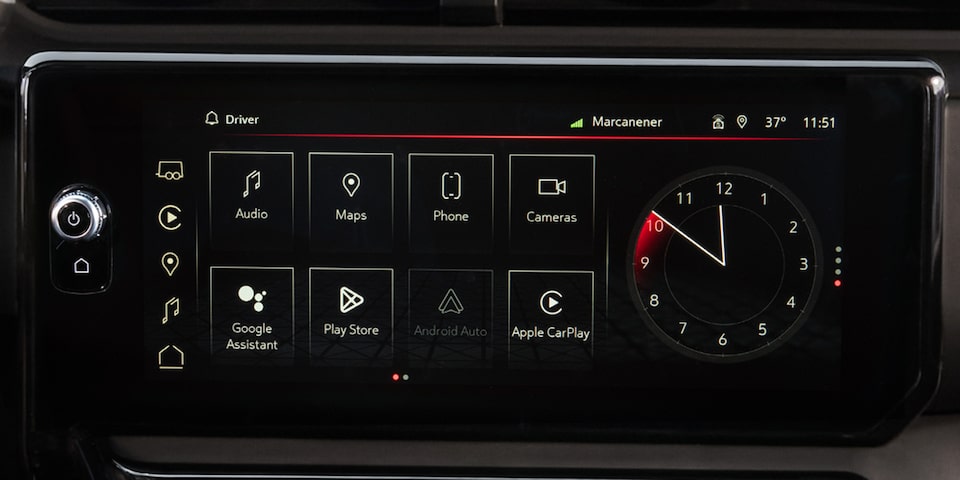 Close-up View of the Dashboard, Infotainment System, and Steering Wheel in a 2025 GMC Sierra HD AT4 Truck