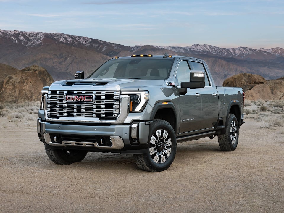 Wide Front Three-Quarters View of the 2025 GMC Sierra HD Denali Truck in the Desert