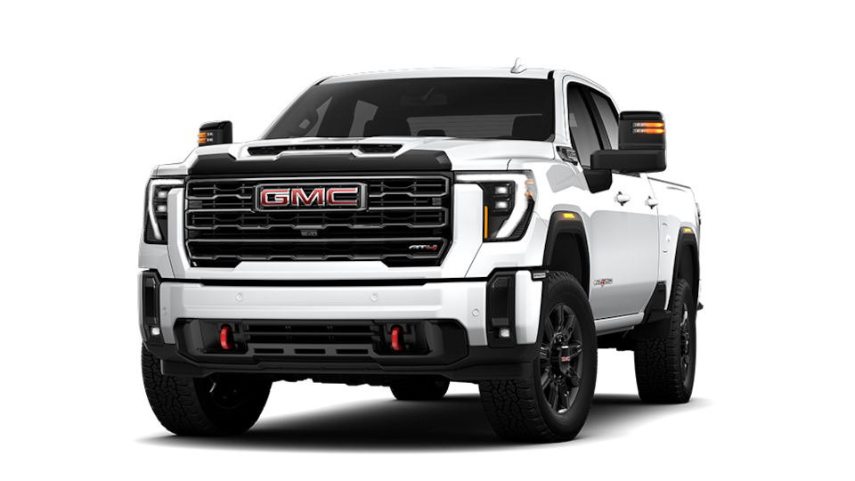 Front Three-Quarters View of a White 2025 GMC Sierra HD AT4 Off-Road Truck