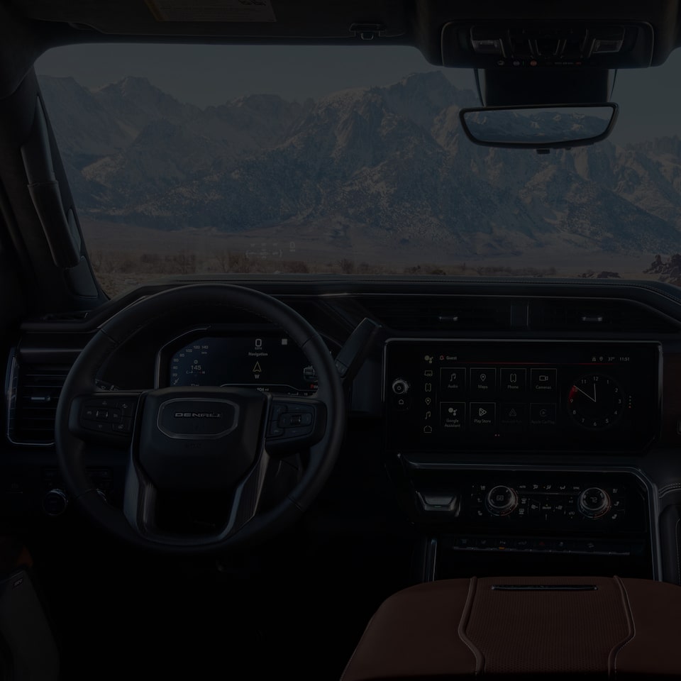 Interior View of the Steering Wheel, Infotainment System and Dashboard in a 2025 GMC Sierra HD