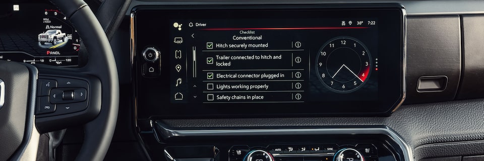 Close-Up of the Towing Checklist on the Infotainment Screen in a 2025 GMC Sierra HD Truck