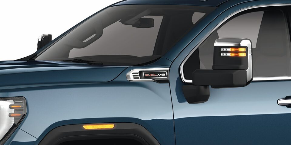 Close-up View of  "6.6 L V8" and "Allison Transmission" Badging on a GMC Truck