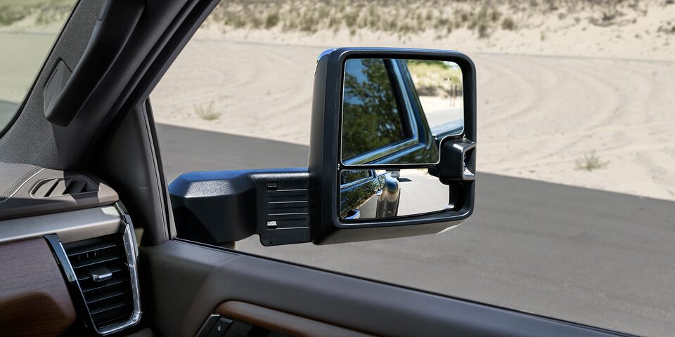 Close-up View of the Passenger Side Mirror on a 2025 GMC Sierra HD Truck