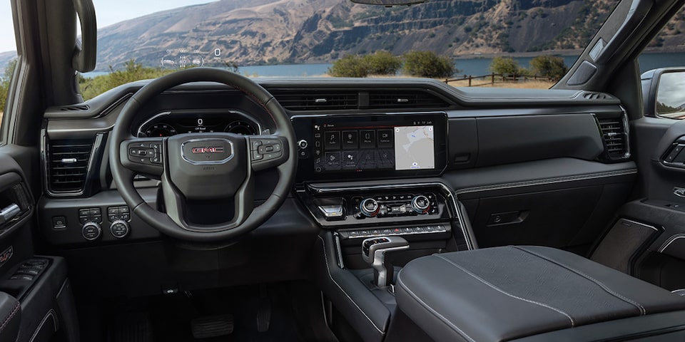 2025 GMC Sierra AT4 Off-Road Truck Interior Driver's Side View of the Steering Wheel and Dashboard