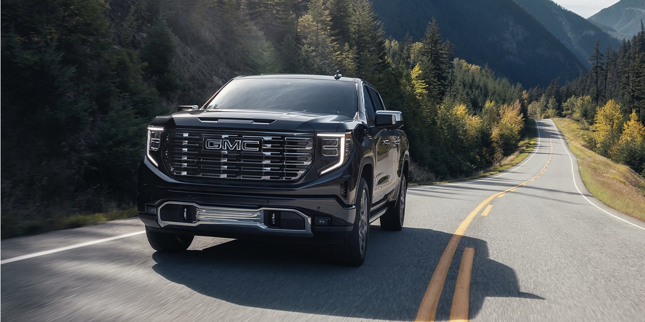 GMC Sierra 1500 Pickup Truck Driving on a highway