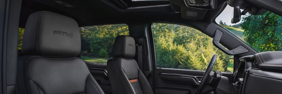 Interior View of the 2025 GMC Sierra AT4 Viewing the Passenger and Driver Leather Seats