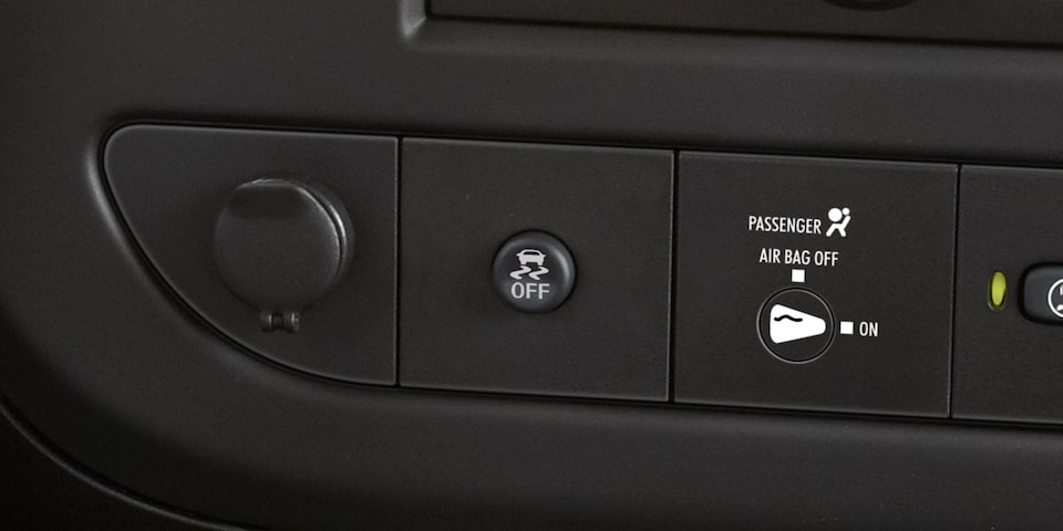 Close-Up on the Stabilitrak Button on the GMC Savana Cargo Van