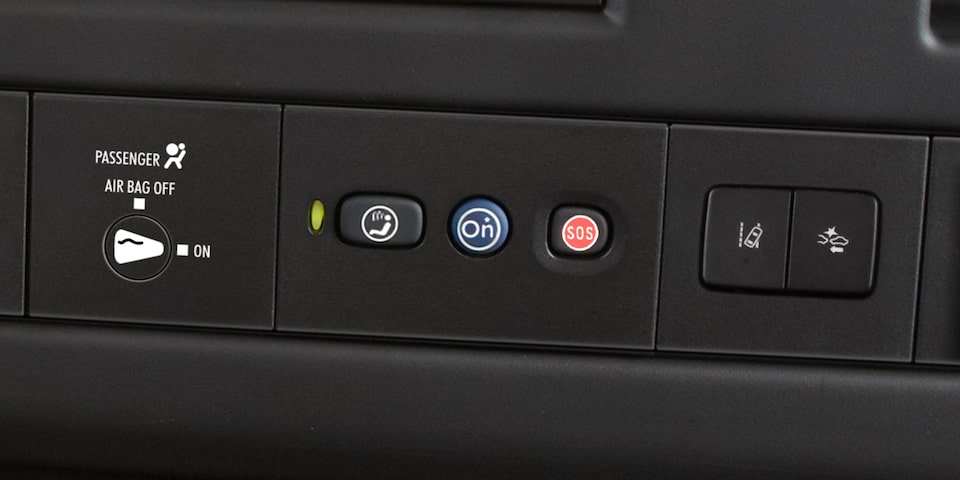 Close-Up View of OnStar and Emergency Services Buttons in a 2025 GMC Savana Passenger Van