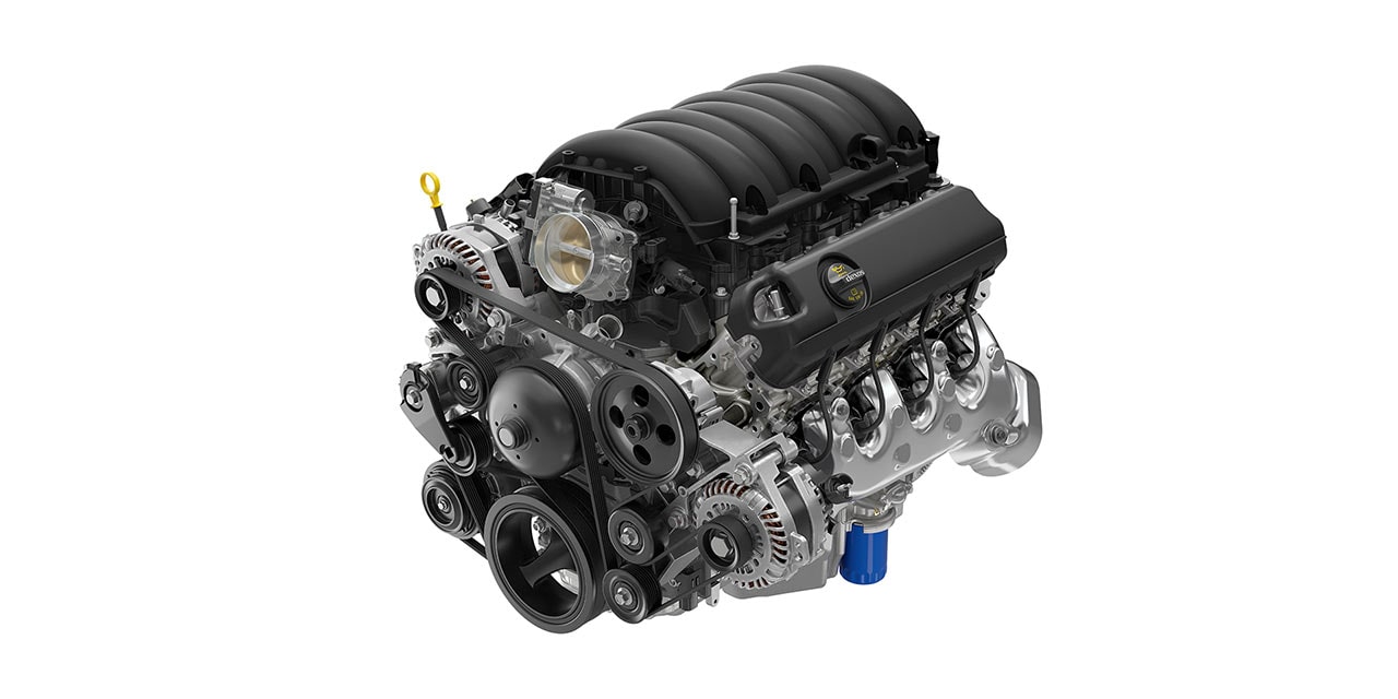 Detailed View of a Powerful and Modern V8 Engine, Highlighted Against a White Background.