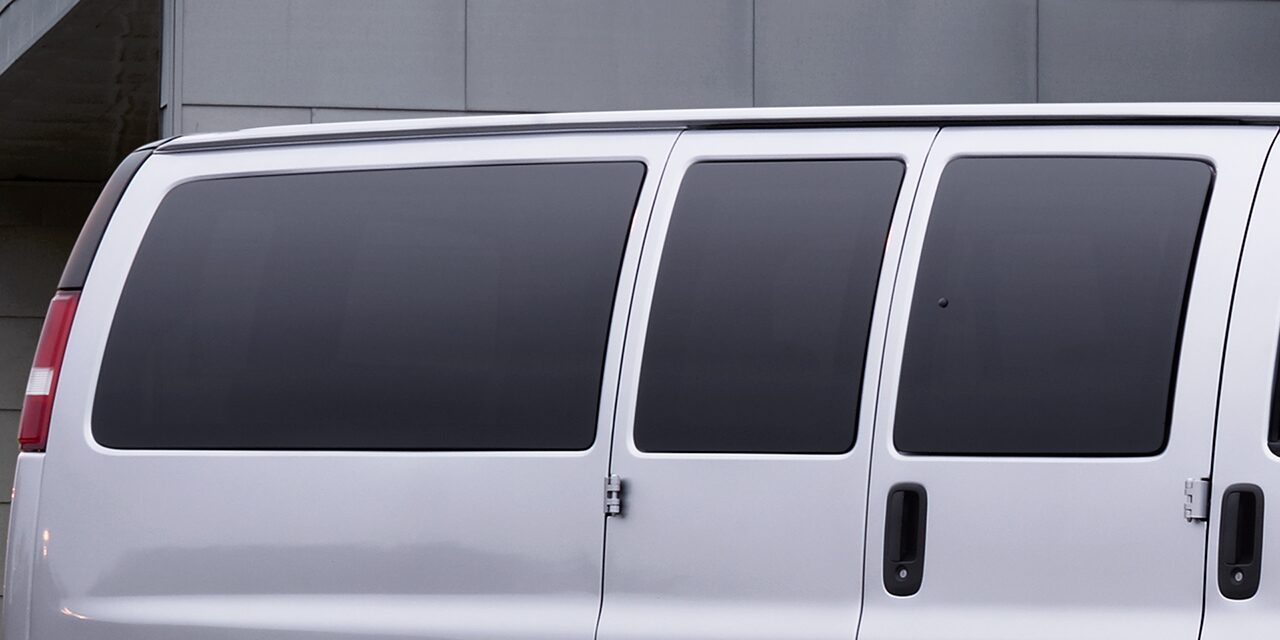 Close-up of the Tinted Windows on a 2026 GMC Savana Passenger Van