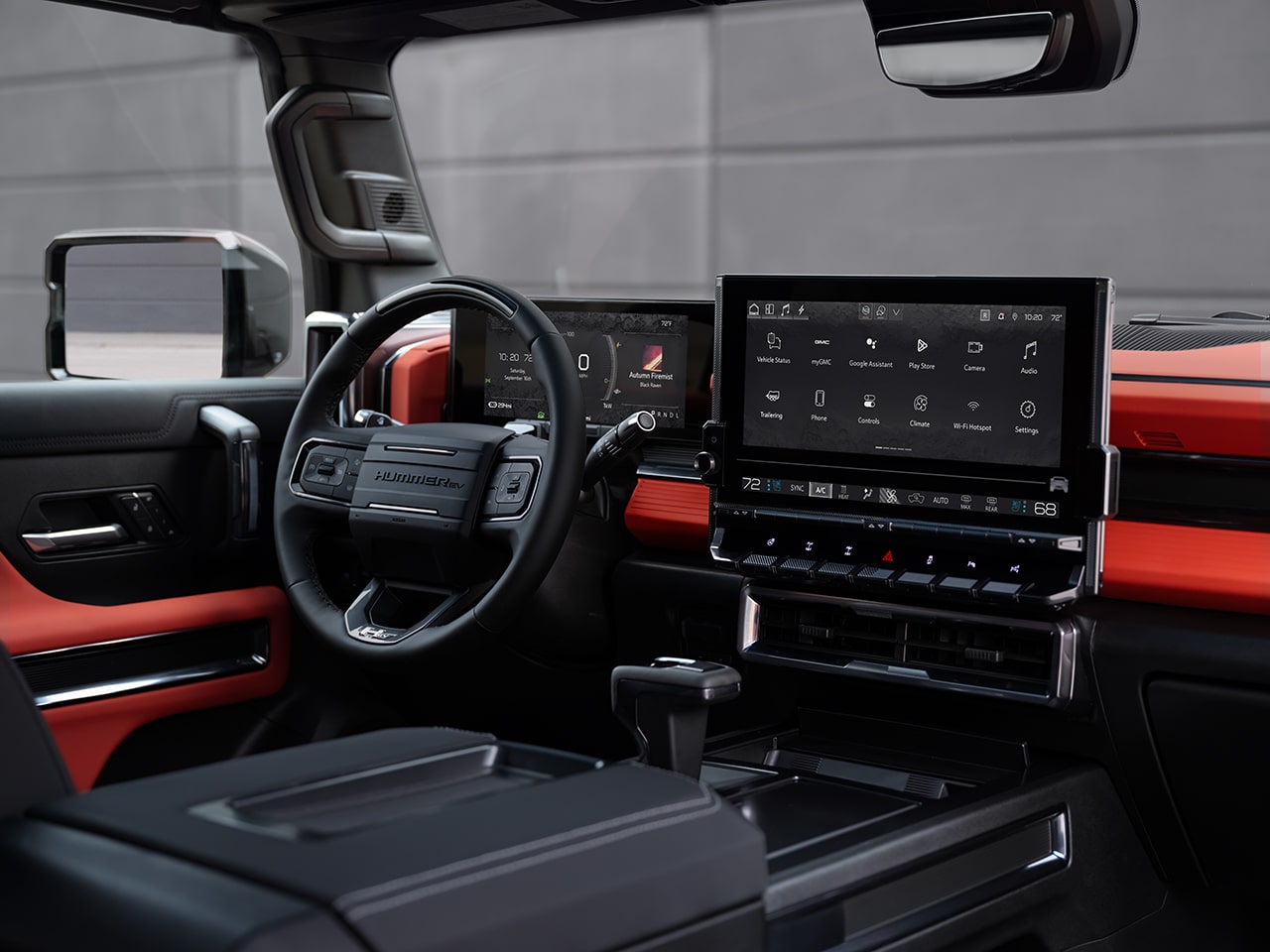 Close-up of the 2026 GMC HUMMER EV Pickup Truck's Driver Seat 11" Driver Info Center and High-definition 13.4" Display Screen