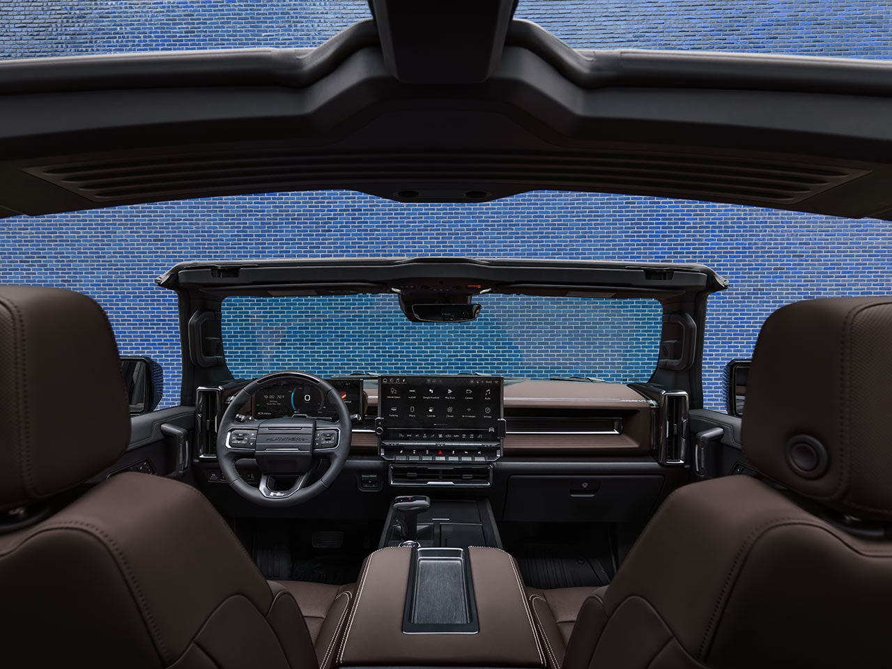 Back Seat View of the 2026 HUMMER EV Front Row Interior And the Infinity Roof with the Transparent Sky Panels Removed