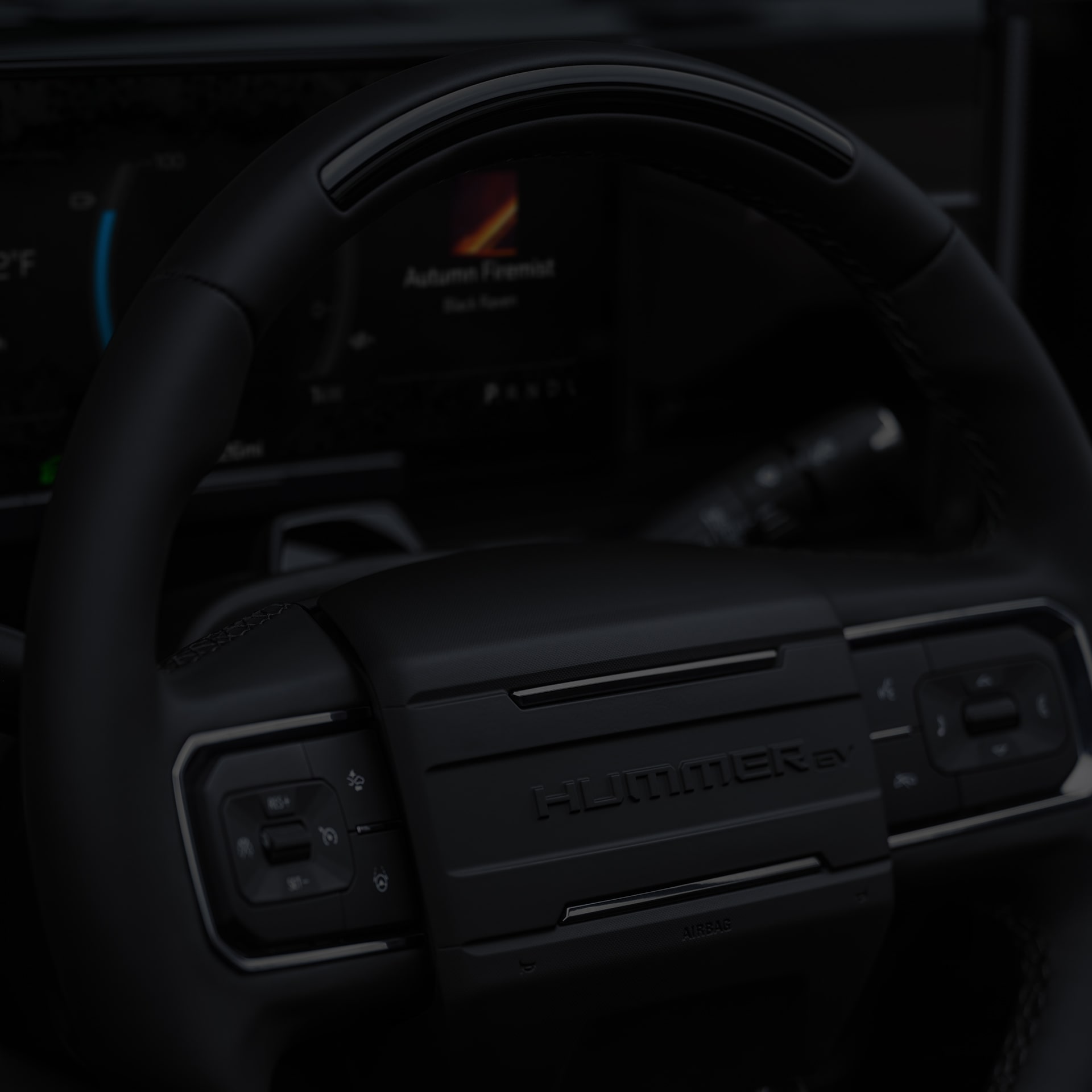Close-up of the 2026 HUMMER EV SUV All-black Steering Wheel
