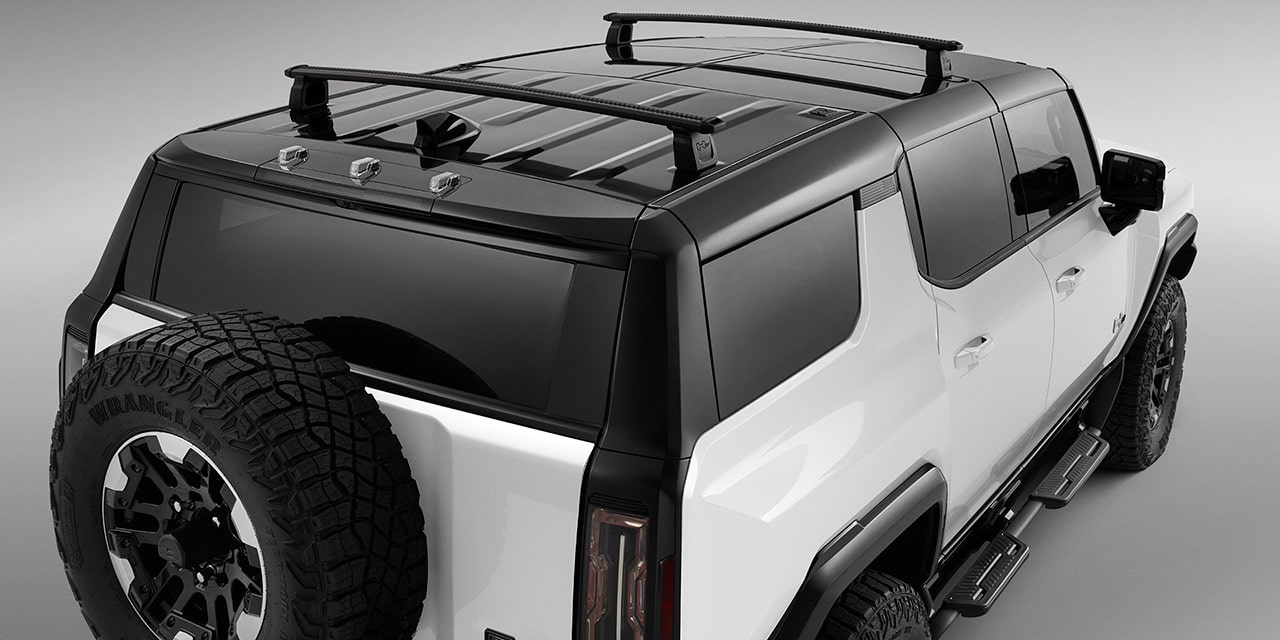 Rear End View of a Personalized 2026 GMC HUMMER EV SUV with Roof Rack Crossbars