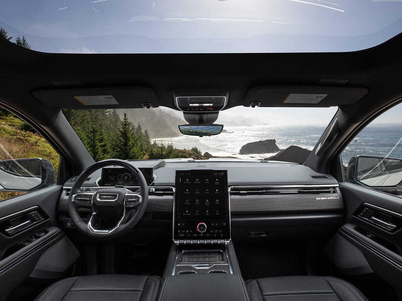Interior View of the Luxurious Dashboard, Steering Wheel, and Infotainment System in the 2026 GMC Sierra EV Denali