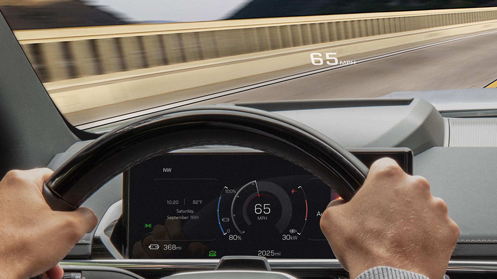 A Driver Using the Head-up Display Feature in Their 2026 GMC Sierra EV Denali