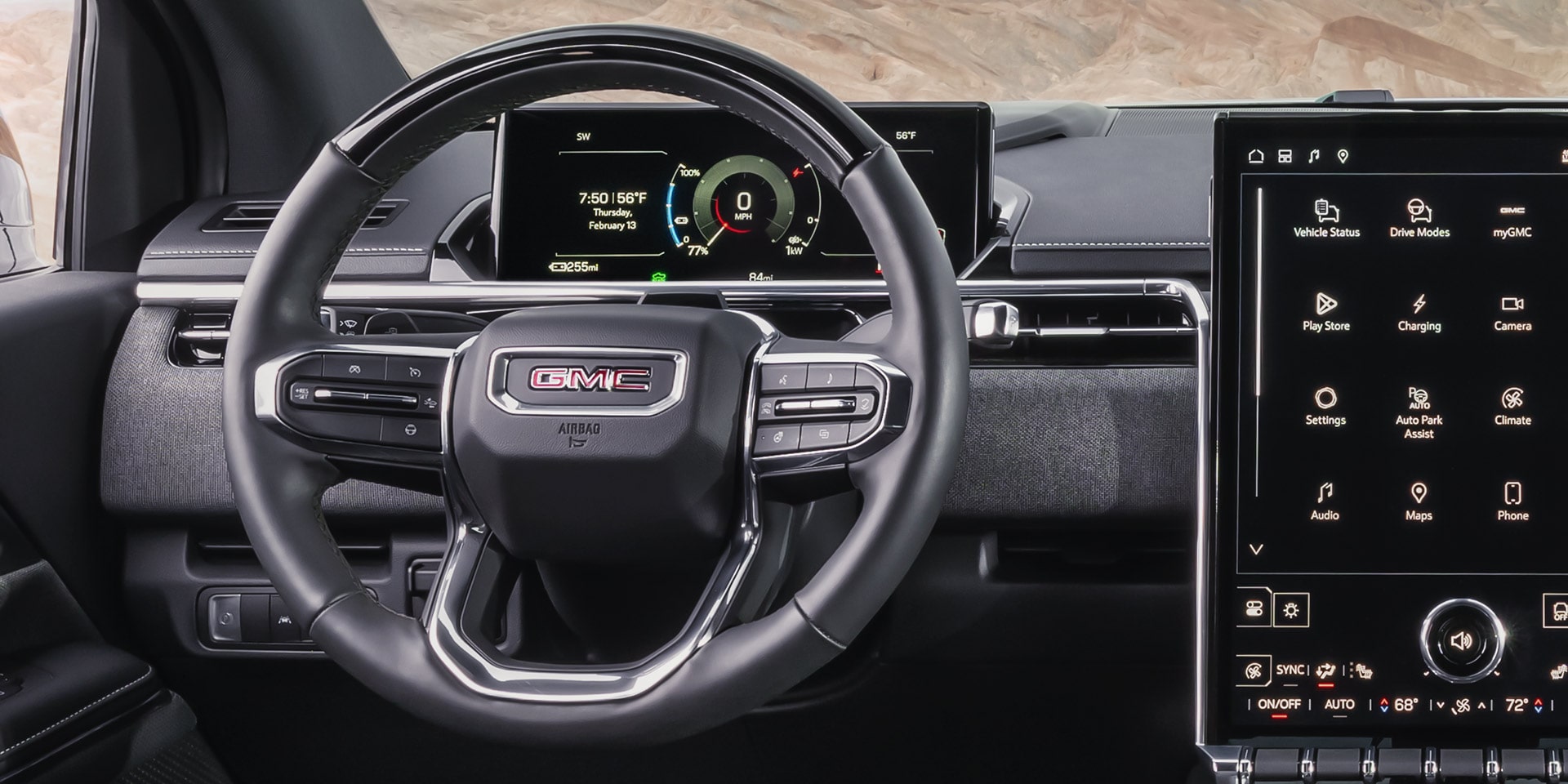 Close-up of the Steering Wheel and Infotainment System in the 2026 GMC Sierra EV Elevation