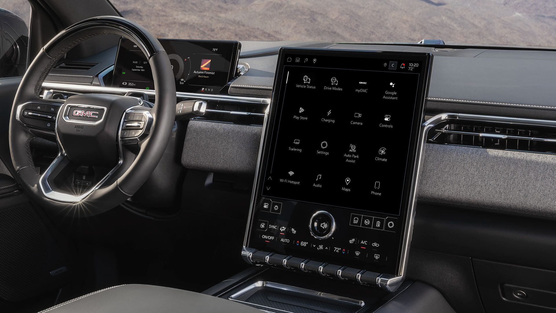 Interior Passenger Side View of the Steering Wheel and Infotainment System in the Sierra EV Elevation