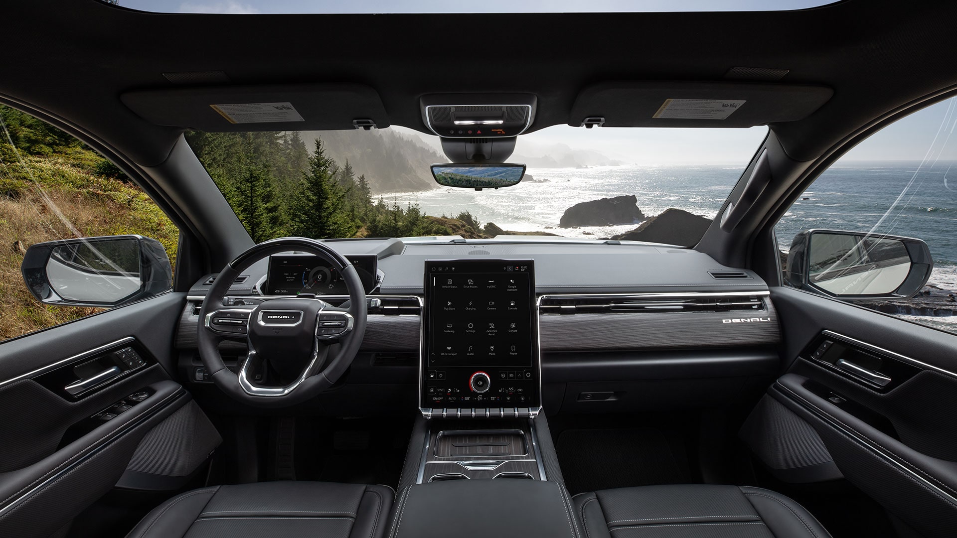 Close-up of the 2026 Sierra EV Pickup Truck's Driver Information Center Behind the Steering Wheel