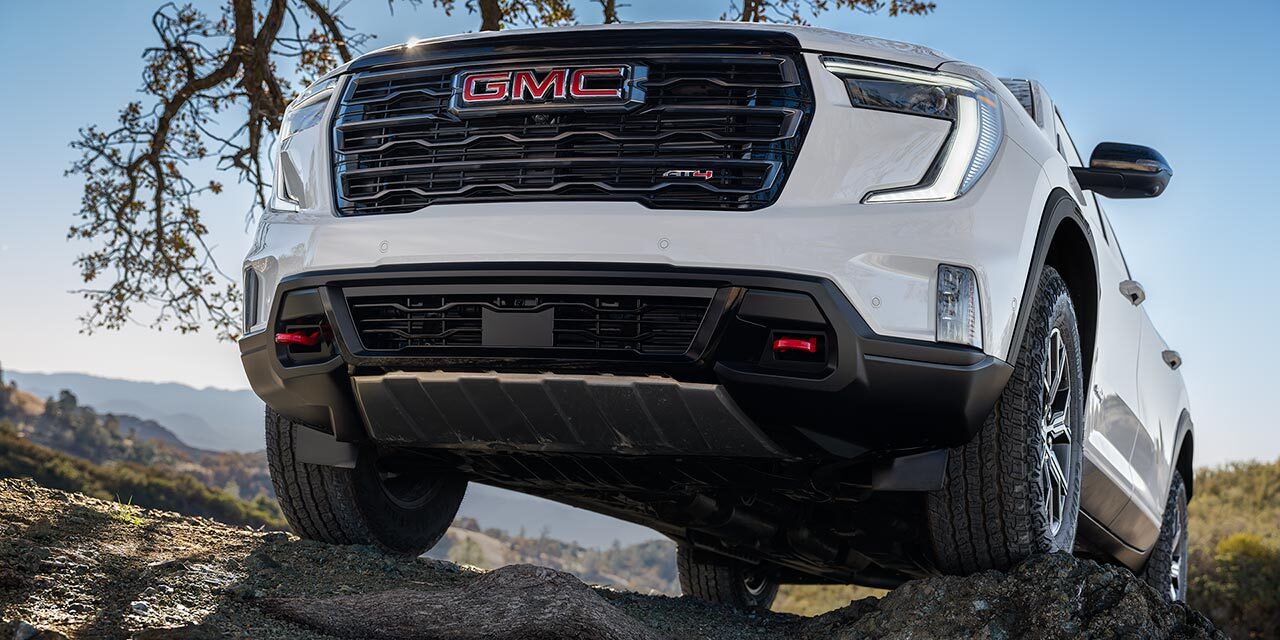 Front View of the 2026 GMC Acadia AT4 Mid-Size Off-Road SUV Grille