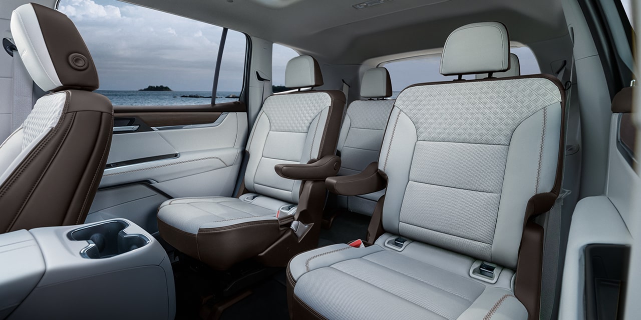 Interior View of the Available Cargo Space with the Second and Third Row Seats Folded Down in the 2026 GMC Acadia Denali Luxury Mid-Size SUV