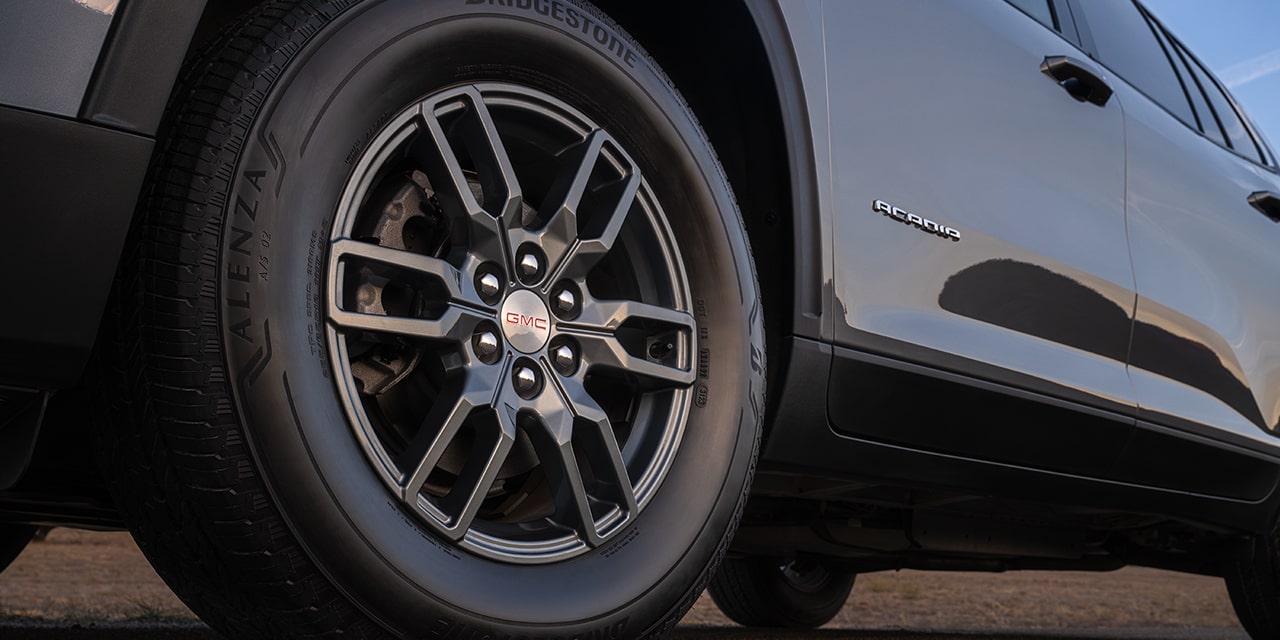 Close-up Exterior View of the Tire and Wheel on the 2026 GMC Acadia Elevation Mid-Size SUV