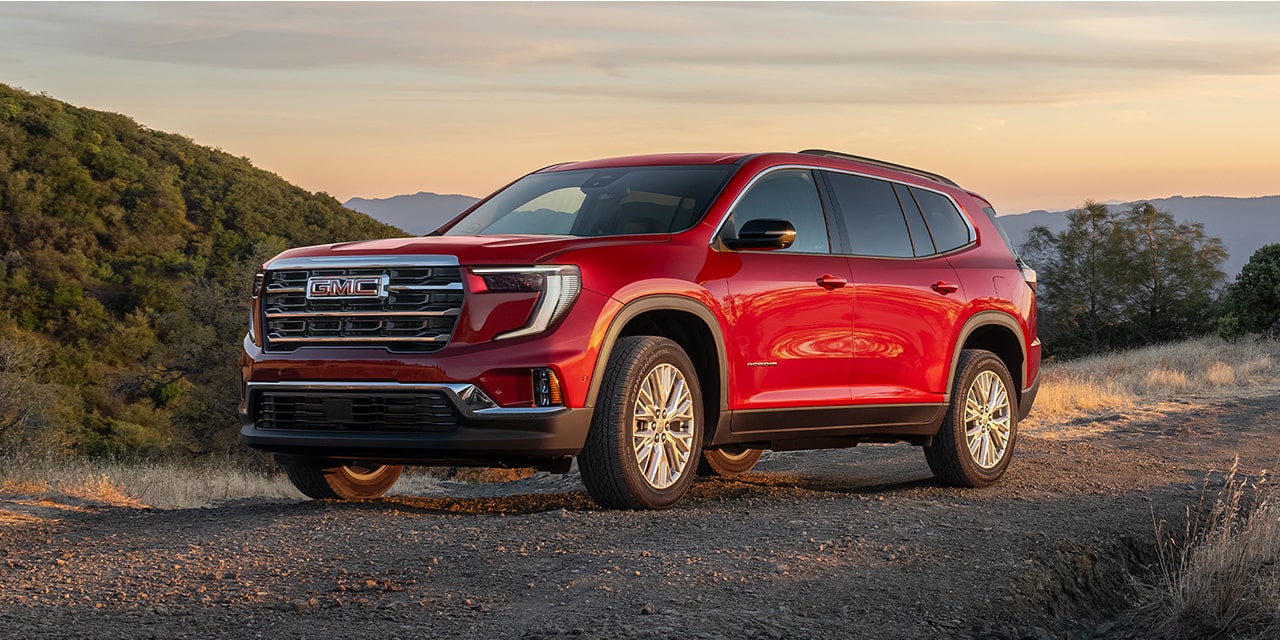 Front Three-Quarters View of a Red 2026 GMC Acadia Elevation Mid-Size SUV