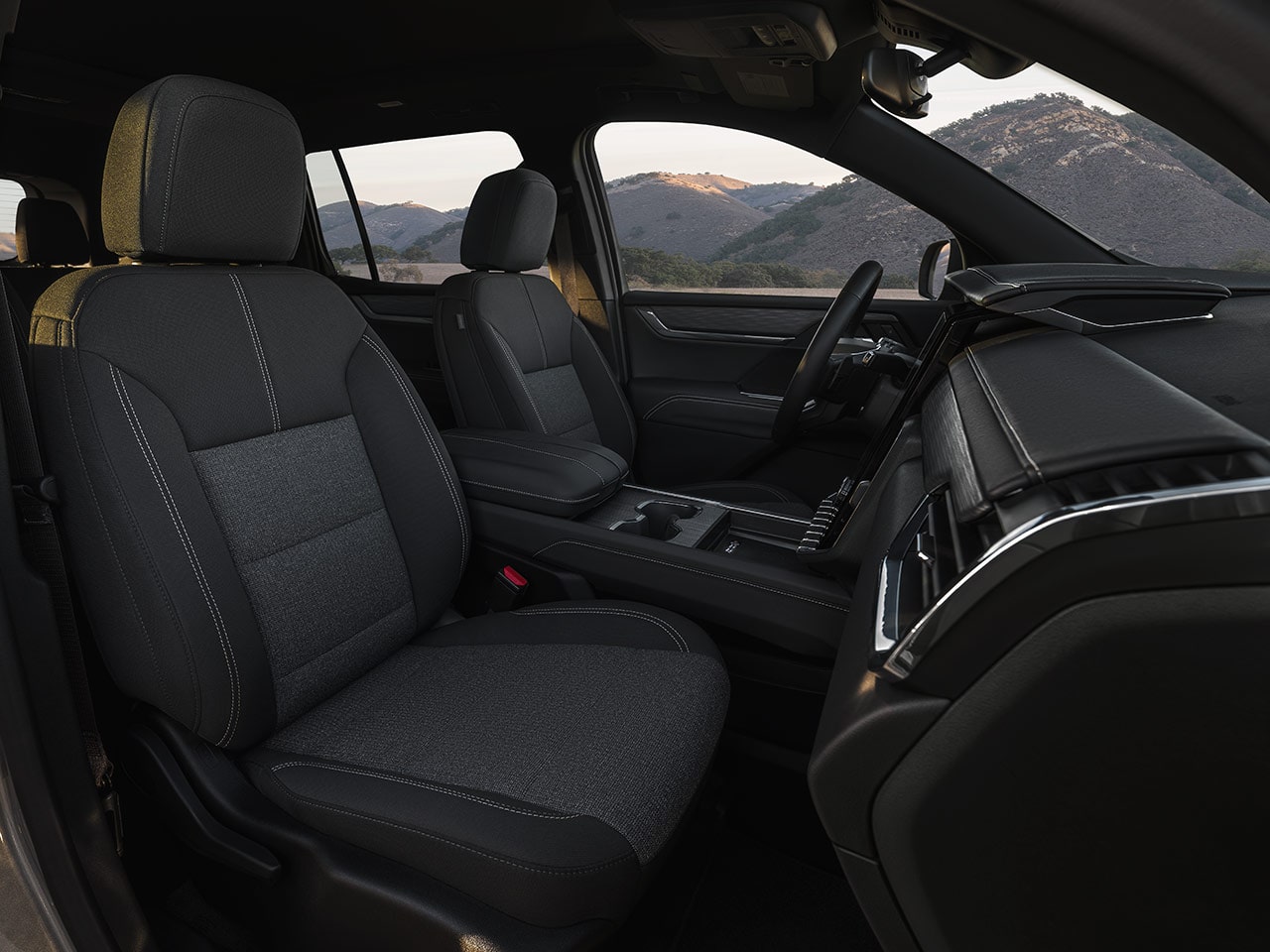 Interior View of the 2026 GMC Acadia Elevation with After Dark Cloth Seats