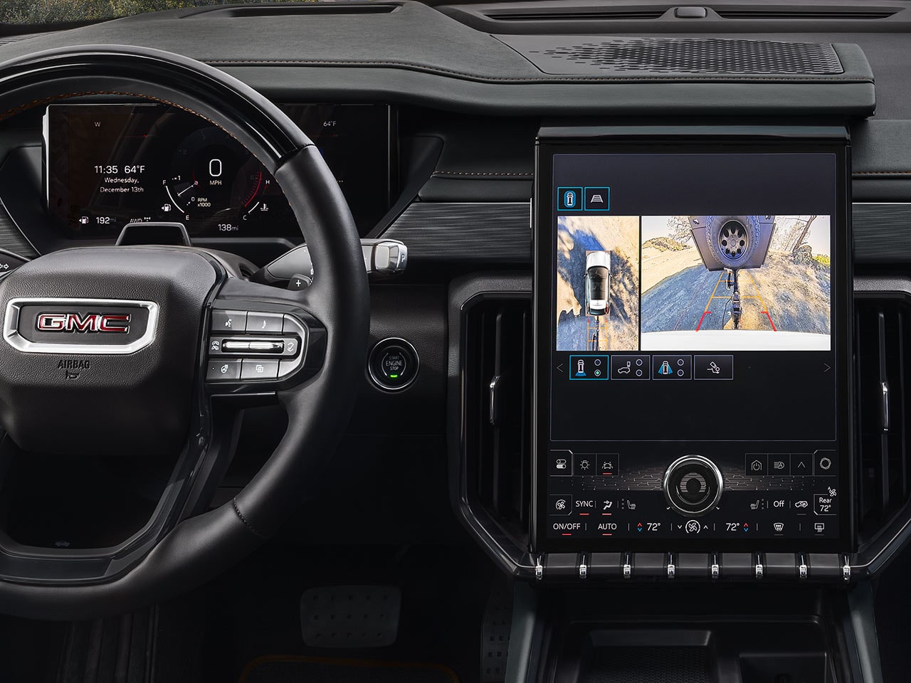 Close-up of the Interior View of the Steering Wheel and Infotainment System in the 2026 GMC Acadia