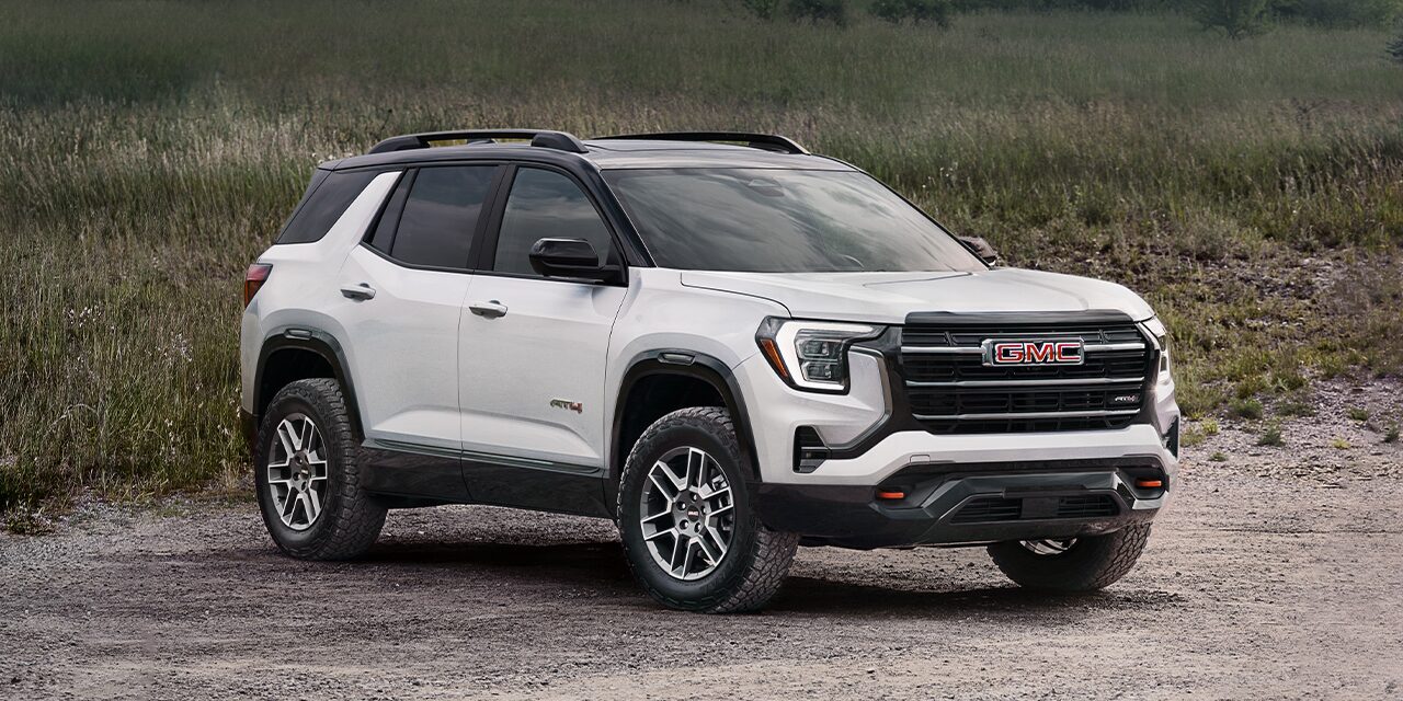Front Three-Quarter View of the 2026 GMC Terrain AT4 Small Off-Road SUV Parked at the Beach