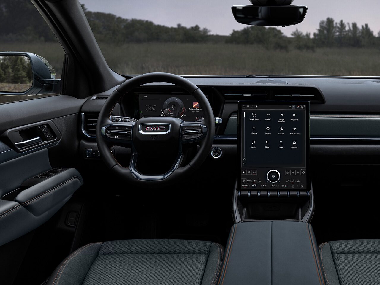 Interior View of the Dashboard, Steering Wheel, and Infotainment System in the 2026 GMC Terrain AT4 Small Off-Road SUV