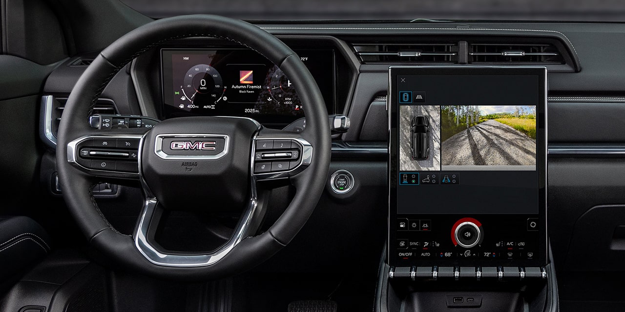 Interior View of the Steering Wheel and Infotainment System in the 2026 GMC Terrain Elevation Compact SUV