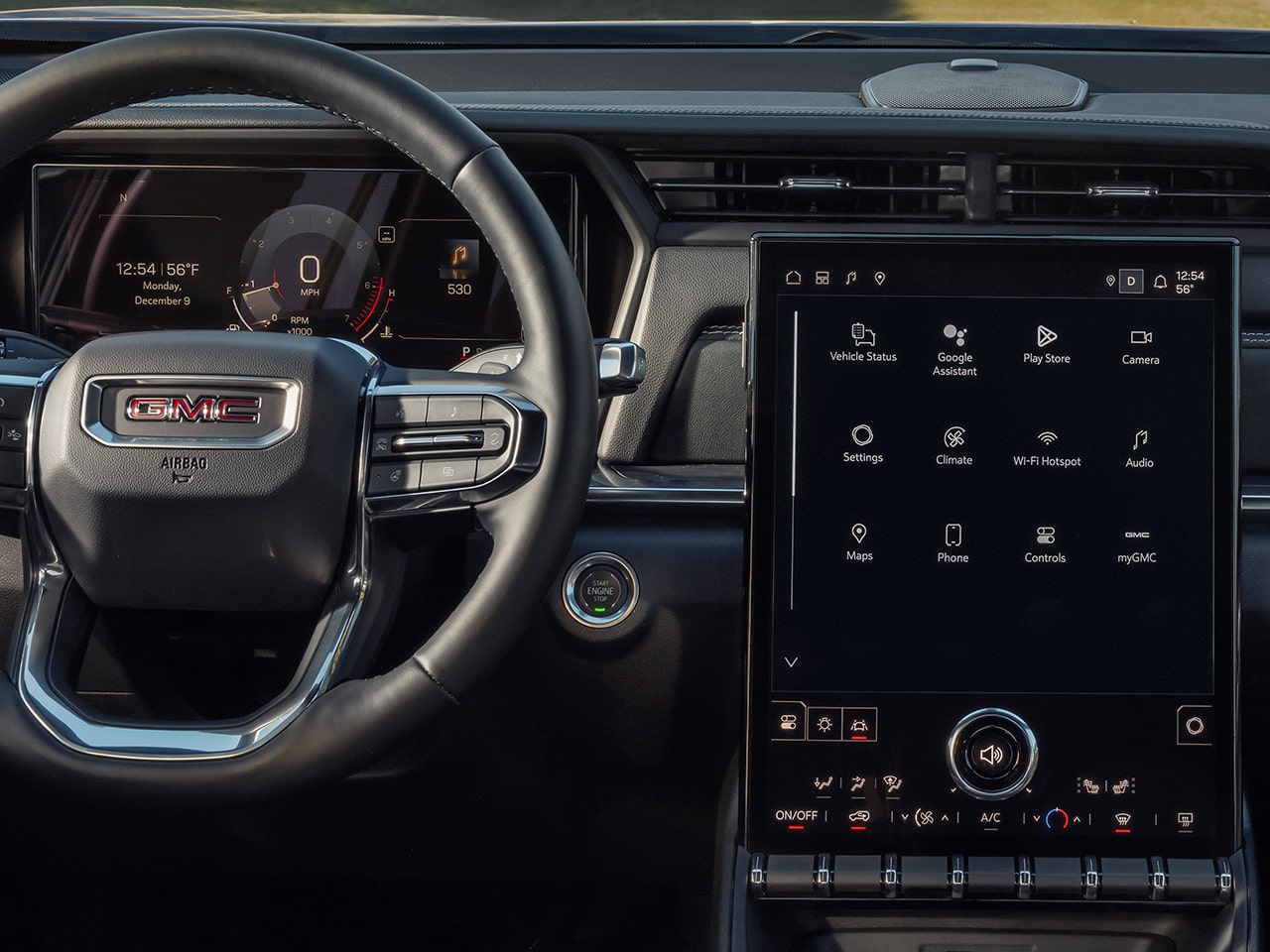 Interior View of the Steering Wheel and Infotainment System in the 2026 GMC Terrain Elevation Compact SUV