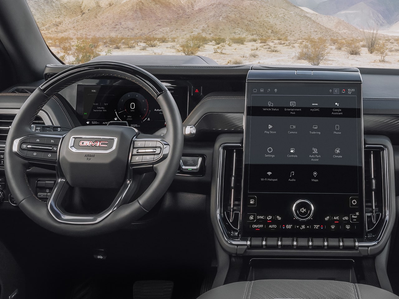 Interior View of the Steering Wheel, Dashboard, and Infotainment System in the 2026 GMC Yukon AT4 Ultimate Full-Size Off-Road SUV