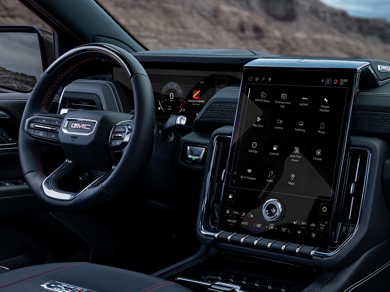 Interior View of the Steering Wheel, Dashboard, and Infotainment System in the 2026 GMC Yukon AT4 Ultimate Full-Size Off-Road SUV