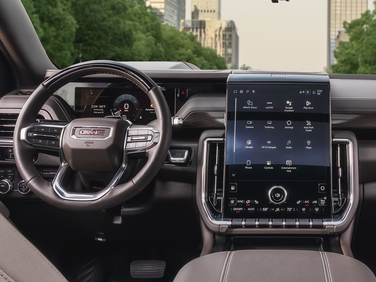 Interior View of the Steering Wheel, Dashboard, and Infotainment System in the 2026 GMC Yukon Elevation Full-Size SUV