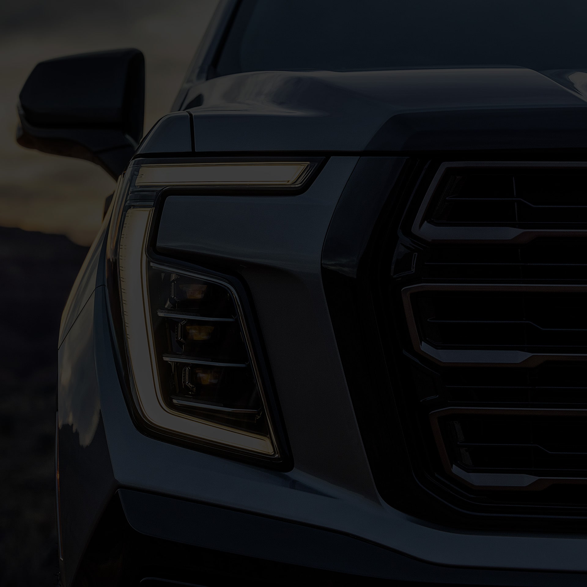 Exterior Close-up View of the Headlamp on the GMC Yukon