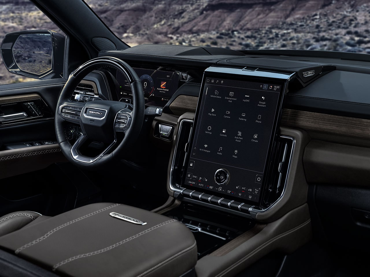 Interior View From the Passenger Side of the Steering Wheel and the Infotainment System in the 2026 Yukon