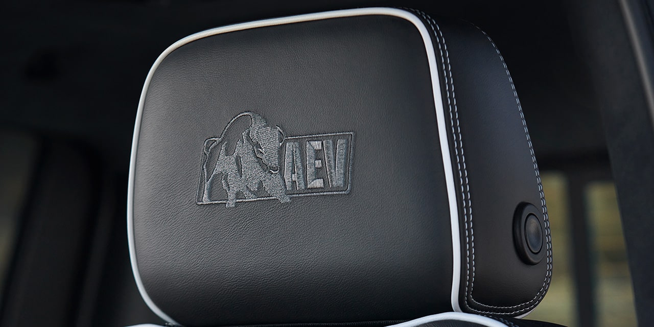 Close-up View of "AEV" Stitching on the Seat in a 2026 GMC Sierra HD AT4X Heavy Duty Off-Road Truck