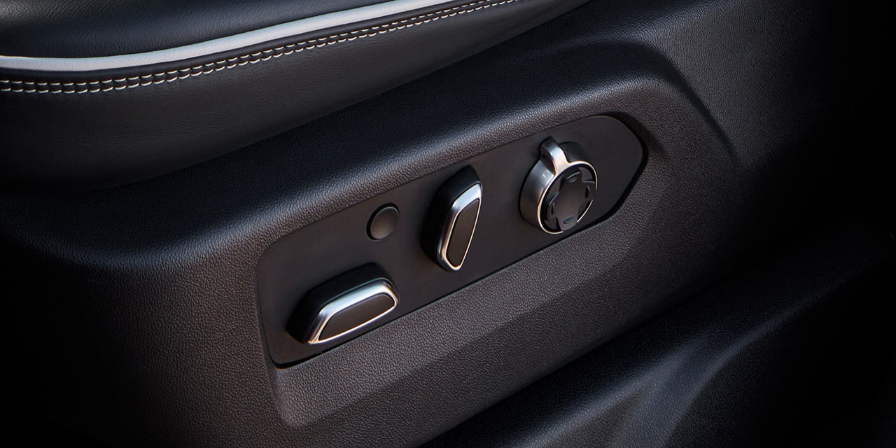 Close-up View of the Seat Controls in a 2026 GMC Sierra HD AT4 Heavy Duty Off-Road Truck