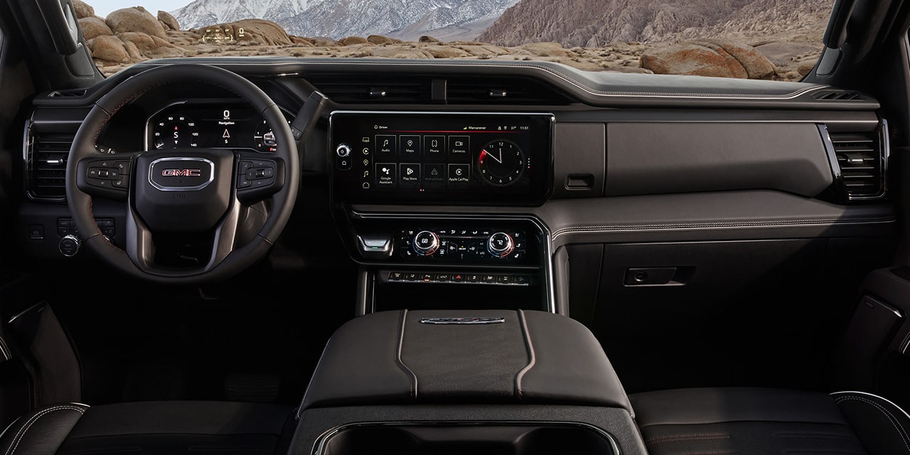 Interior View of Front Seats and the Dashboard in a 2026 GMC Sierra HD AT4 Heavy Duty Off-Road Truck
