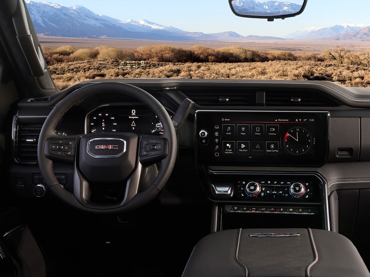 Wide View of the Dashboard, Infotainment System, and Steering Wheel in a 2026 GMC Sierra HD AT4 Truck