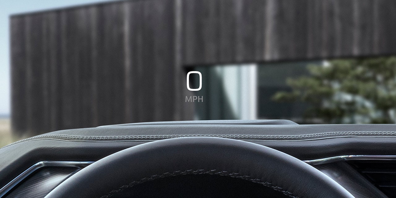 Close-up View of the Heads Up Display Feature in Use in a 2026 GMC Sierra HD Denali Luxury Truck