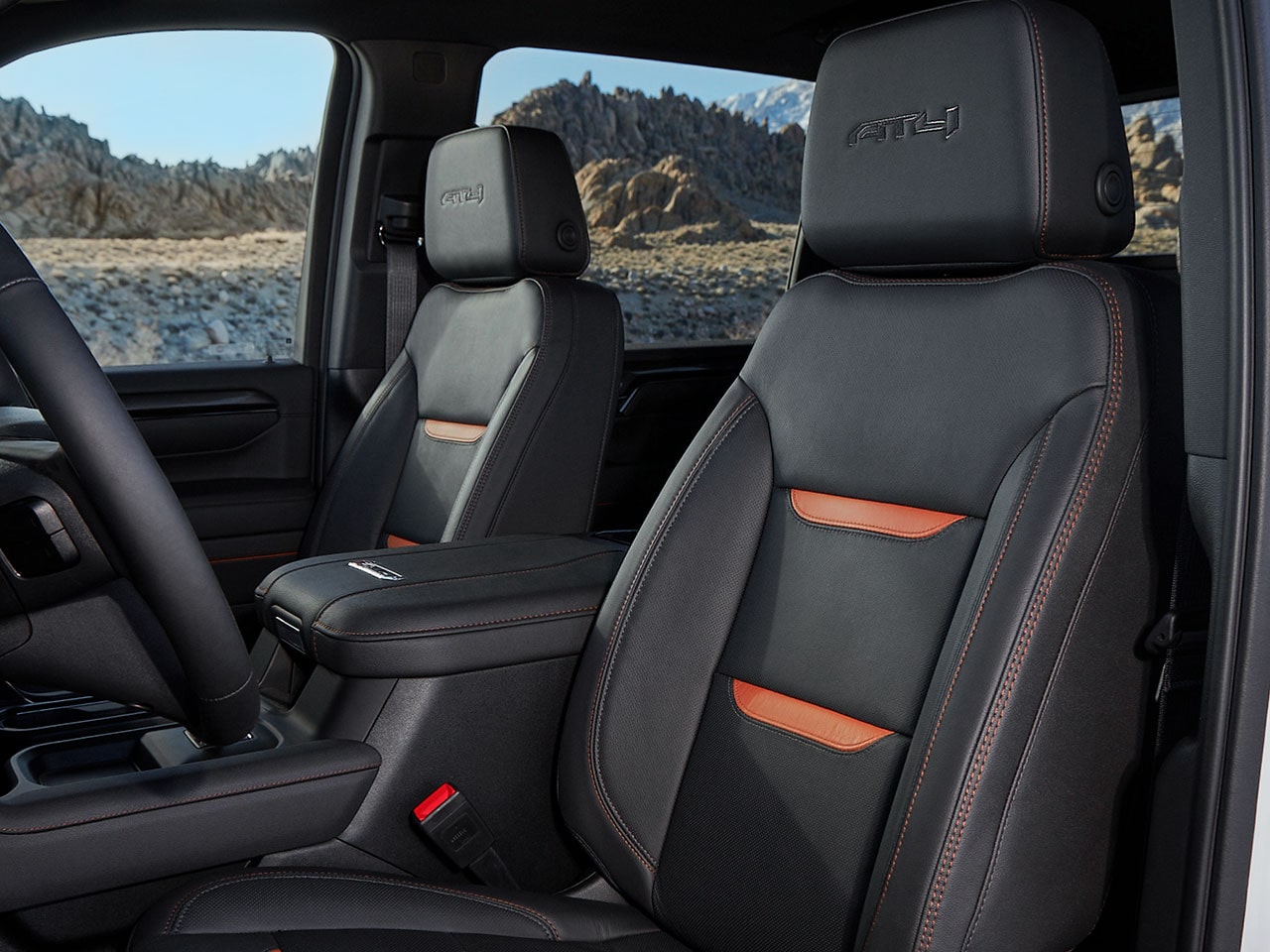 Close-up of the 2026 GMC Sierra HD Heavy Duty Truck Back Row Jet Black Interior Seats with Kalahari Accents