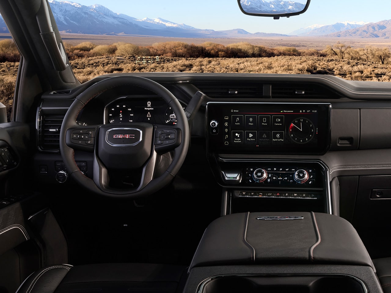 The Interior View of the Steering Wheel and Dashboard in the 2026 GMC Sierra HD Heavy Duty Truck